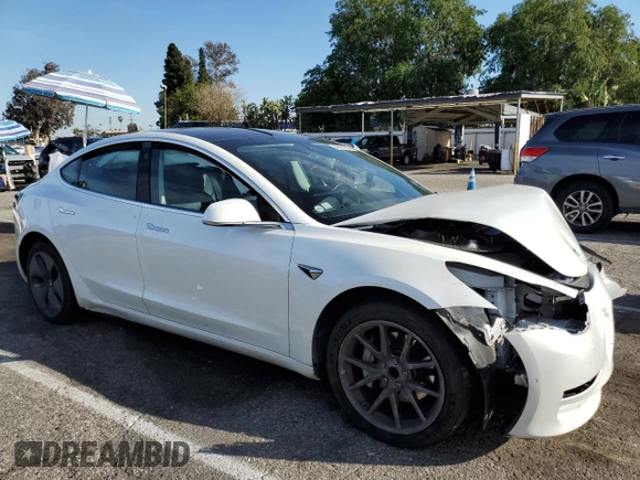 2019 Tesla Model 3 Mid Range z VIN 5YJ3E1EA7KF300175, wystawiony jako Copart lot #49651815 z przebiegiem Nie podano mil oraz Szkoda całkowita • Salvage title. Historia ofert i sprzedaży dostępna na DreamBid. Obrazek 4.