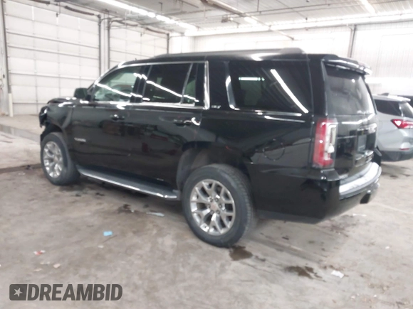 2016 GMC Yukon SLT with VIN 1GKS2BKC9GR176948, listed as a IAAI auction lot 41361221 with 125,178 mi miles. Bid and sale history available at carsss.com. Image 3.