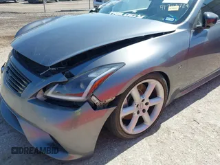 2014 Infiniti Q60 Journey z VIN JN1CV6EK1EM110800, wystawiony jako IAAI lot #41793724 z przebiegiem 134 408 mil mil oraz . Historia ofert i sprzedaży dostępna na DreamBid. Obrazek 18.
