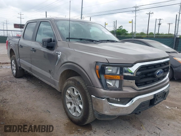 2023 Ford F-150 XL with VIN 1FTFW1E81PFB71702, listed as a IAAI auction lot 42102699 with 57,007 mi miles. Bid and sale history available at carsss.com. Image 1.