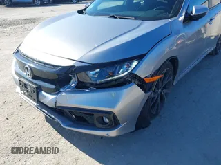 2019 Honda Civic Sport with VIN 2HGFC2F8XKH602463, listed as a IAAI auction lot 41966052 with 95,416 mi miles and . Bid and sale history available at DreamBid. Image 17.