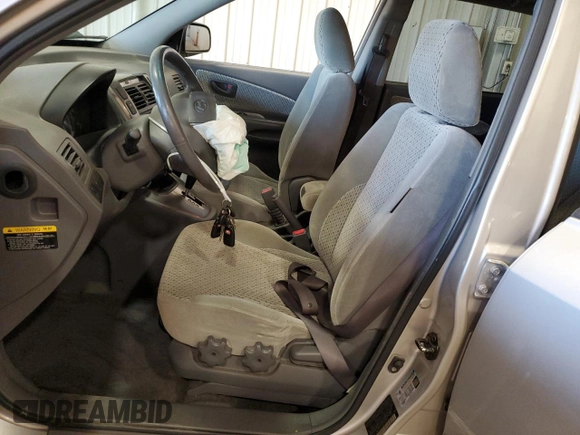 2005 Hyundai Tucson GLS with VIN KM8JN12D45U130595, listed as a Copart auction lot 79824124 with 209,287 mi miles and Salvage Title. Bid and sale history available at carsss.com. Image 7.