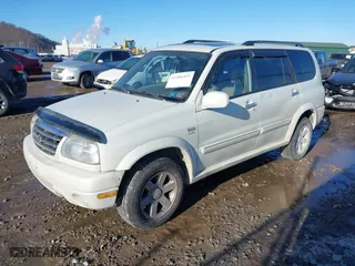2003 Suzuki XL-7 Touring with VIN JS3TX92V734100178, listed as a IAAI auction lot 41386492 with 91,912 mi miles. Bid and sale history available at carsss.com. Image 2.