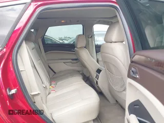 2014 Cadillac SRX Luxury Collection z VIN 3GYFNBE39ES576335, wystawiony jako IAAI lot #42093334 z przebiegiem 69 804 mil mil oraz . Historia ofert i sprzedaży dostępna na DreamBid. Obrazek 8.