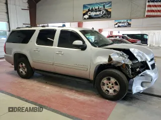 2014 Chevrolet Suburban LT with VIN 1GNSKJE77ER120211, listed as a Copart auction lot 62469424 with 213,282 mi miles and Salvage Title. Bid and sale history available at carsss.com. Image 4.
