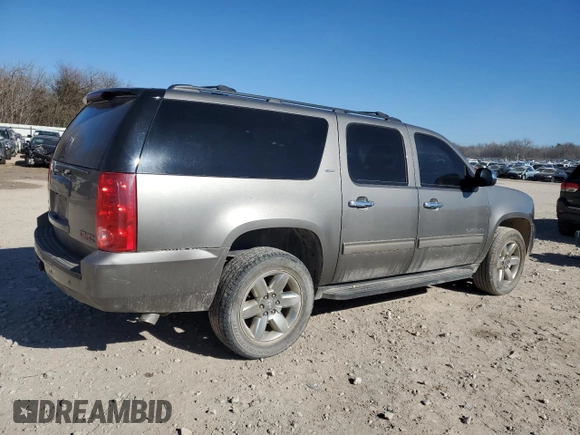 2012 GMC Yukon XL SLT with VIN 1GKS2KE72CR279315, listed as a Copart auction lot 87589195 with 220,584 mi miles and Salvage Title. Bid and sale history available at carsss.com. Image 3.