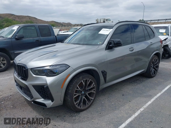 2022 BMW X5 M with VIN 5YMJU0C00N9M59253, listed as a IAAI auction lot 41476833 with 27,813 mi miles. Bid and sale history available at carsss.com. Image 2.