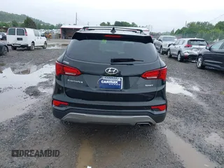 2017 Hyundai Santa Fe 2.4L z VIN 5NMZU3LB3HH011127, wystawiony jako IAAI lot #42369671 z przebiegiem 91 634 mil mil oraz . Historia ofert i sprzedaży dostępna na DreamBid. Obrazek 16.