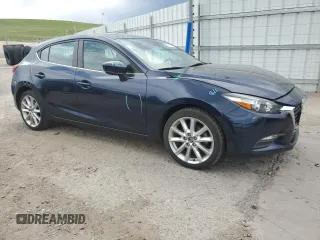 2017 Mazda 3 Touring with VIN 3MZBN1L7XHM138580, listed as a Copart auction lot 58924525 with 101,717 mi miles and Salvage title. Bid and sale history available at DreamBid. Image 4.