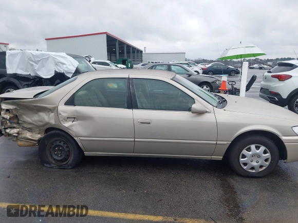 1997 Toyota Camry LE z VIN 4T1BG22K9VU786181, wystawiony jako IAAI lot #41610928 z przebiegiem 338 829 mil mil oraz . Historia ofert i sprzedaży dostępna na DreamBid. Obrazek 13.