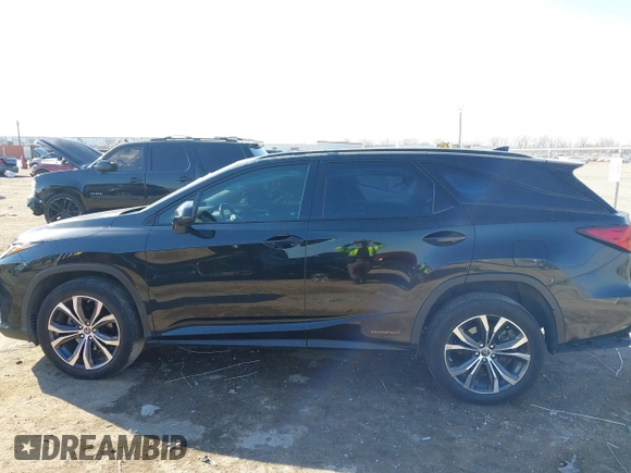 2018 Lexus RX 450hL Premium z VIN JTJDGKCA1J2004770, wystawiony jako IAAI lot #41329524 z przebiegiem 86 774 mil mil oraz . Historia ofert i sprzedaży dostępna na DreamBid. Obrazek 14.