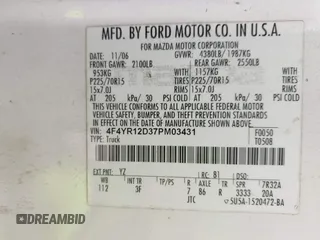 2007 Mazda B-Series Truck with VIN 4F4YR12D37PM03431, listed as a IAAI auction lot 42133980 with 330,728 mi miles and . Bid and sale history available at DreamBid. Image 9.