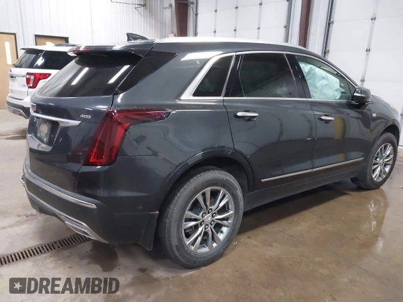 2023 Cadillac XT5 AWD Premium Luxury with VIN 1GYKNDRS2PZ122350, listed as a IAAI auction lot 42123718 with 17,971 mi miles and . Bid and sale history available at DreamBid. Image 4.