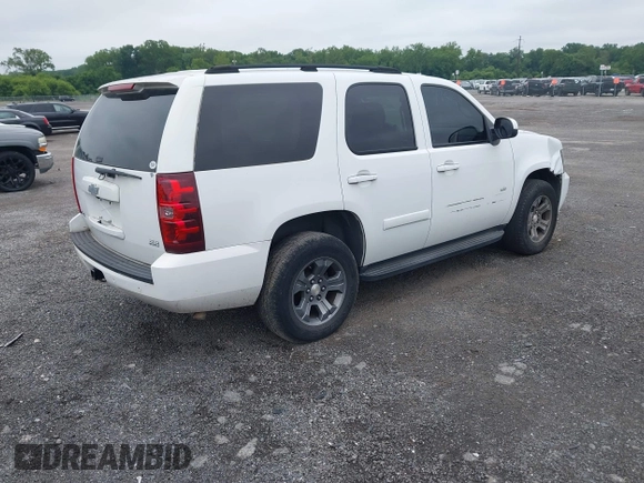 2007 Chevrolet Tahoe LTZ with VIN 1GNFK13007J149042, listed as a IAAI auction lot 42593189 with 216,791 mi miles and . Bid and sale history available at DreamBid. Image 4.