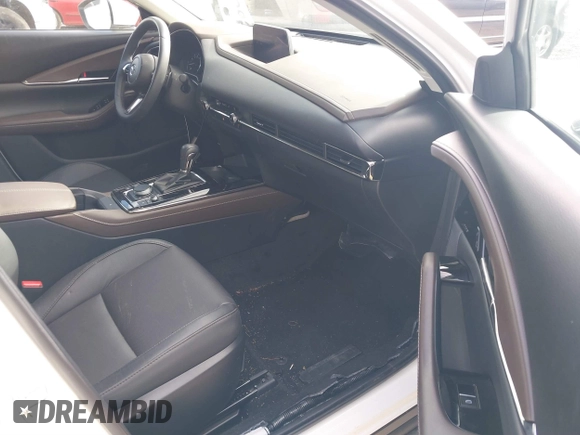 2024 Mazda CX-30 S Premium with VIN 3MVDMBDM5RM630460, listed as a IAAI auction lot 41135965 with 5,544 mi miles and . Bid and sale history available at DreamBid. Image 5.