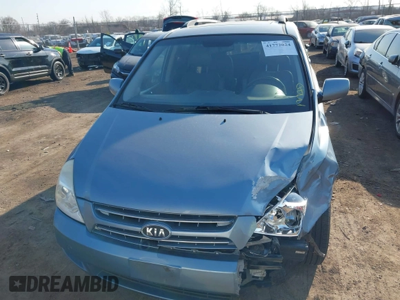 2010 Kia Sedona EX with VIN KNDMH4C38A6334878, listed as a IAAI auction lot 41772024 with 208,818 mi miles. Bid and sale history available at carsss.com. Image 13.
