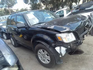 2011 Mercury Mariner with VIN 4M2CN8B73BKJ03051, listed as a IAAI auction lot 27968407 with 106,058 mi miles. Bid and sale history available at carsss.com. Image 1.