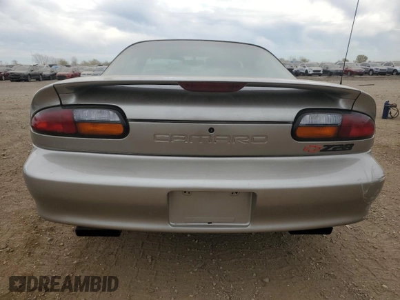 1999 Chevrolet Camaro Z28 z VIN 2G1FP22G2X2136787, wystawiony jako Copart lot #76599644 z przebiegiem 47 740 mil mil oraz Szkoda całkowita • Salvage title. Historia ofert i sprzedaży dostępna na DreamBid. Obrazek 6.