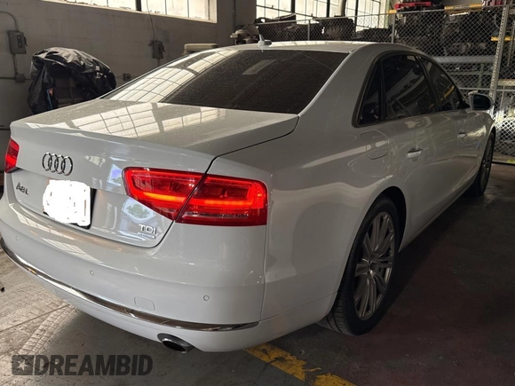2014 Audi A8 3.0L TDI with VIN WAURMAFD2EN003811, listed as a Copart auction lot 61867575 with 120,705 mi miles and Clean title. Bid and sale history available at DreamBid. Image 4.