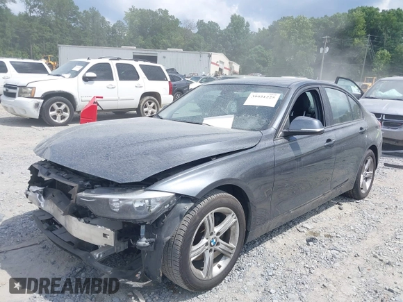 2013 BMW 3 Series 320i with VIN WBA3B1C54DF462873, listed as a IAAI auction lot 39931225 with 118,917 mi miles and . Bid and sale history available at DreamBid. Image 2.