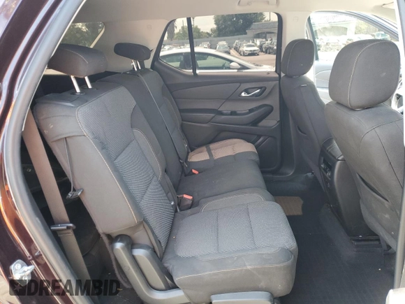 2018 Chevrolet Traverse LT Cloth z VIN 1GNERGKW6JJ200115, wystawiony jako Copart lot #54846515 z przebiegiem 79 785 mil mil oraz Szkoda całkowita • Salvage title. Historia ofert i sprzedaży dostępna na DreamBid. Obrazek 11.