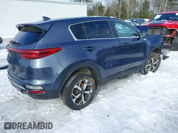 2020 Kia Sportage LX with VIN KNDPMCAC7L7835859, listed as a IAAI auction lot 41631071 with 52,438 mi miles and . Bid and sale history available at carsss.com. Image 4.