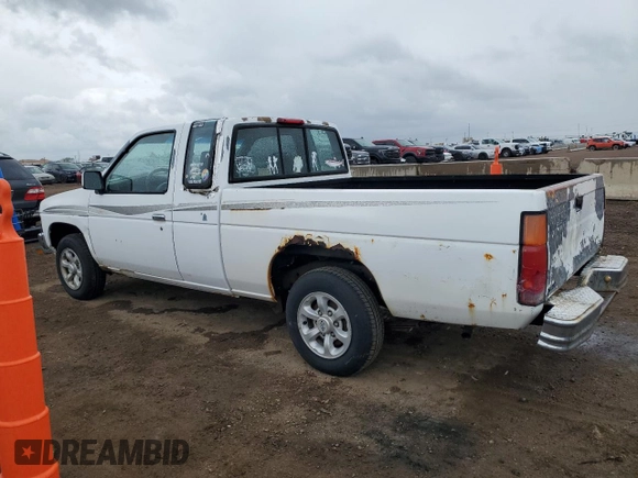 1997 Nissan Frontier XE with VIN 1N6SD16S8VC426940, listed as a Copart auction lot 55860235 with 242,265 mi miles and Salvage title. Bid and sale history available at DreamBid. Image 2.