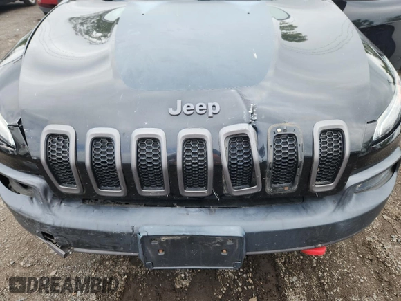 2014 Jeep Cherokee Trailhawk with VIN 1C4PJMBS3EW127928, listed as a Copart auction lot 63825865 with 172,712 mi miles and Salvage title. Bid and sale history available at DreamBid. Image 12.