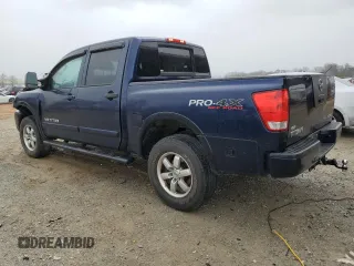 2011 Nissan Titan Pro-4X z VIN 1N6BA0EC0BN322228, wystawiony jako Copart lot #47617305 z przebiegiem 189 151 mil mil oraz Szkoda całkowita • Salvage title. Historia ofert i sprzedaży dostępna na DreamBid. Obrazek 2.