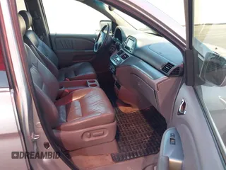 2008 Honda Odyssey EX-L with VIN 5FNRL38758B008724, listed as a IAAI auction lot 42202383 with 199,977 mi miles and . Bid and sale history available at DreamBid. Image 5.