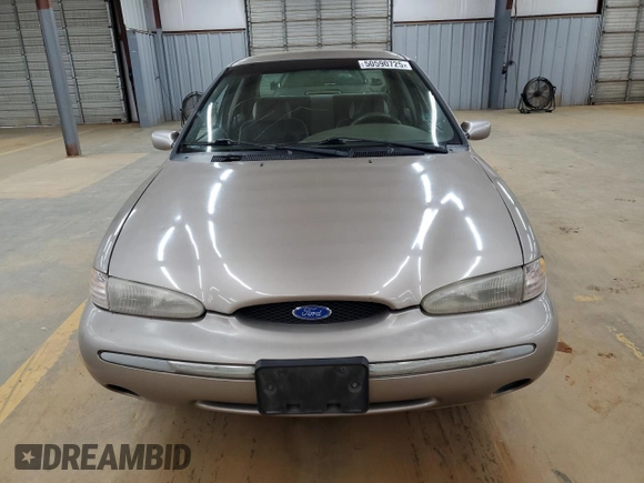 1995 Ford Contour LX with VIN 1FALP6531SK243263, listed as a Copart auction lot 50590725 with 105,347 mi miles and Salvage title. Bid and sale history available at DreamBid. Image 5.