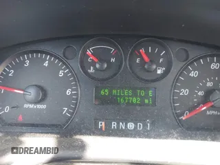 2005 Ford Taurus SE with VIN 1FAFP53U95A289971, listed as a IAAI auction lot 42143134 with 167,702 mi miles. Bid and sale history available at carsss.com. Image 7.