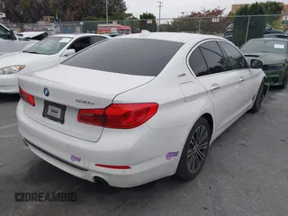 2018 BMW 5 Series 530e with VIN WBAJA9C56JB252738, listed as a IAAI auction lot 42260352 with 113,581 mi miles and . Bid and sale history available at DreamBid. Image 4.