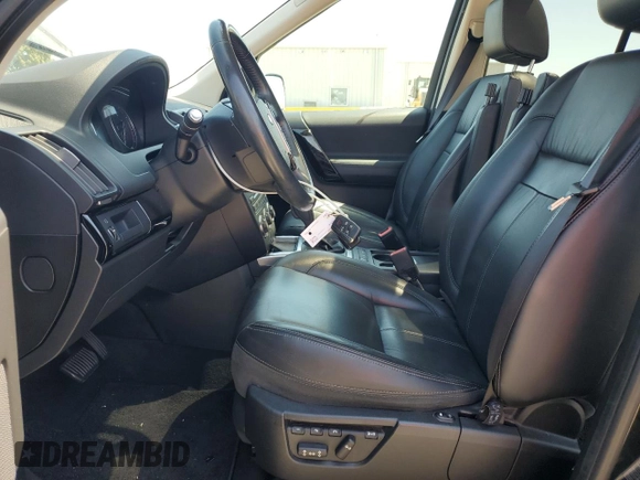 2014 Land Rover LR2 HSE Lux с VIN SALFT2BG8EH410747, выставлен на аукционе Copart как лот 63845985 с пробегом 107 239 миль миль и Чистый • Clean title. История ставок и продаж доступна на DreamBid. Изображение 7.