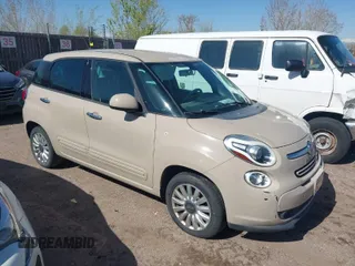 2014 FIAT 500L Easy with VIN ZFBCFABHXEZ018239, listed as a IAAI auction lot 41980543 with 100,661 mi miles. Bid and sale history available at carsss.com. Image 1.