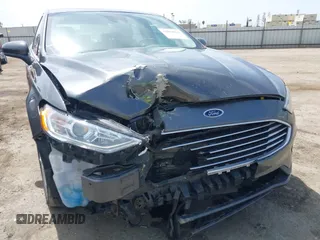 2019 Ford Fusion SE with VIN 3FA6P0LU3KR174108, listed as a IAAI auction lot 42094264 with 87,700 mi miles and . Bid and sale history available at carsss.com. Image 6.