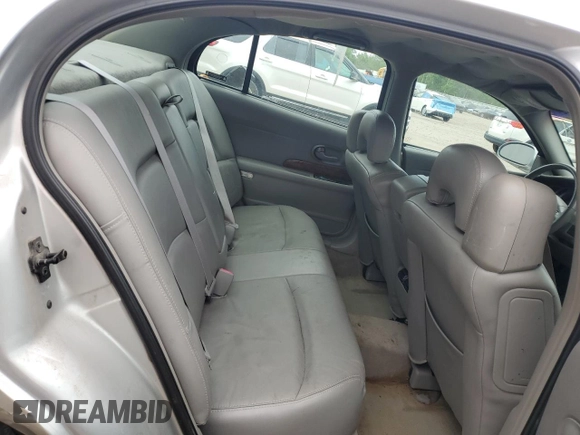 2002 Buick LeSabre Limited с VIN 1G4HR54K12U216867, выставлен на аукционе Copart как лот 61035265 с пробегом 109 630 миль миль и Списание • Salvage title. История ставок и продаж доступна на DreamBid. Изображение 10.