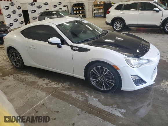 2016 Scion FR-S with VIN JF1ZNAA15G9701621, listed as a Copart auction lot 52331315 with 54,746 mi miles and Clean Title. Bid and sale history available at DreamBid. Image 4.