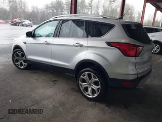 2019 Ford Escape Titanium with VIN 1FMCU9J9XKUA37695, listed as a IAAI auction lot 41868388 with 50,095 mi miles. Bid and sale history available at carsss.com. Image 3.