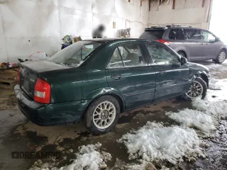 1999 Mazda Protege DX z VIN JM1BJ2220X0108600, wystawiony jako Copart lot #77004894 z przebiegiem 220 836 mil mil oraz Szkoda całkowita • Salvage title. Historia ofert i sprzedaży dostępna na DreamBid. Obrazek 3.