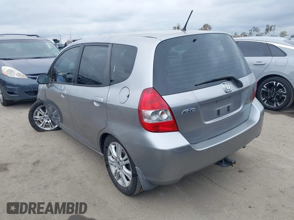 2007 Honda Fit with VIN JHMGD37467S065669, listed as a IAAI auction lot 42078795 with 124,030 mi miles. Bid and sale history available at carsss.com. Image 3.
