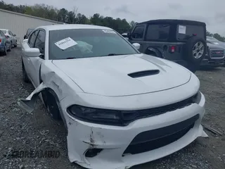 2021 Dodge Charger R/T z VIN 2C3CDXCT1MH608261, wystawiony jako IAAI lot #41861254 z przebiegiem 42 034 mil mil oraz . Historia ofert i sprzedaży dostępna na DreamBid. Obrazek 1.