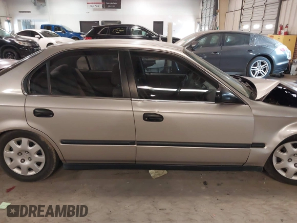 2000 Honda Civic LX with VIN 1HGEJ6578YL042505, listed as a IAAI auction lot 41331854 with 226,727 mi miles. Bid and sale history available at carsss.com. Image 13.
