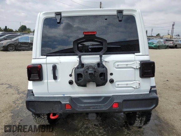 2023 Jeep Wrangler Rubicon with VIN 1C4HJXFG3PW691724, listed as a Copart auction lot 50985745 with 32,377 mi miles and Salvage title. Bid and sale history available at DreamBid. Image 6.