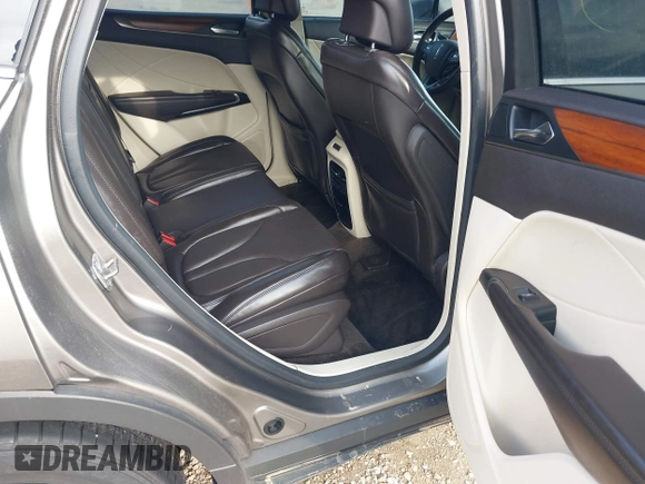 2016 Lincoln MKC Reserve with VIN 5LMCJ3D97GUJ31720, listed as a IAAI auction lot 41655116 with Not provided miles and . Bid and sale history available at DreamBid. Image 8.