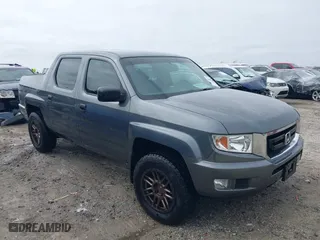 2010 Honda Ridgeline RT with VIN 5FPYK1F28AB010815, listed as a IAAI auction lot 40405105 with 275,762 mi miles. Bid and sale history available at carsss.com. Image 1.