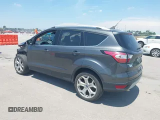 2018 Ford Escape Titanium with VIN 1FMCU9J99JUD43804, listed as a IAAI auction lot 41101250 with 56,438 mi miles and . Bid and sale history available at DreamBid. Image 3.