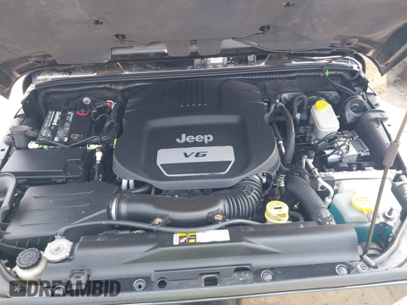 2014 Jeep Wrangler Unlimited Sahara with VIN 1C4BJWEG0EL273086, listed as a IAAI auction lot 42340938 with 121,448 mi miles and . Bid and sale history available at DreamBid. Image 10.