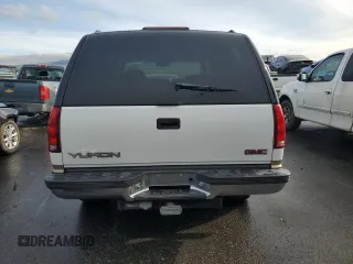 1999 GMC Yukon with VIN 1GKEK13RXXJ735870, listed as a Copart auction lot 44988505 with 150,557 mi miles and Salvage Title. Bid and sale history available at carsss.com. Image 6.
