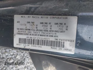 2009 Mazda 3 i Touring Value with VIN JM1BK32F291249221, listed as a IAAI auction lot 42006435 with 249,775 mi miles. Bid and sale history available at carsss.com. Image 9.